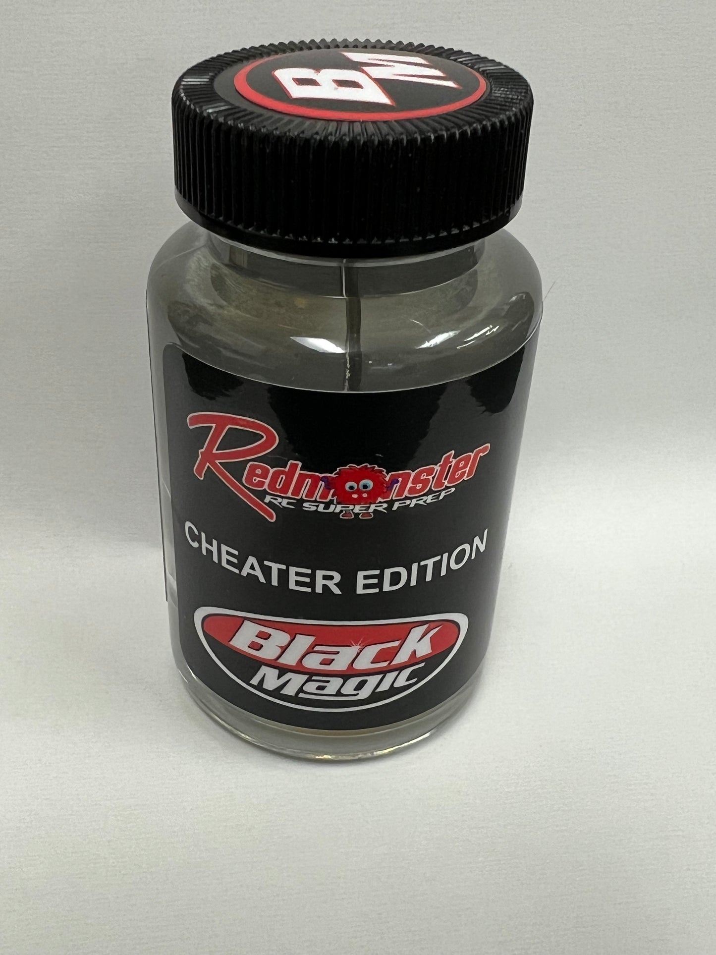 RED MONSTER 4OZ BLACK MAGIC TIRE REFRESHER (RM 2068)
